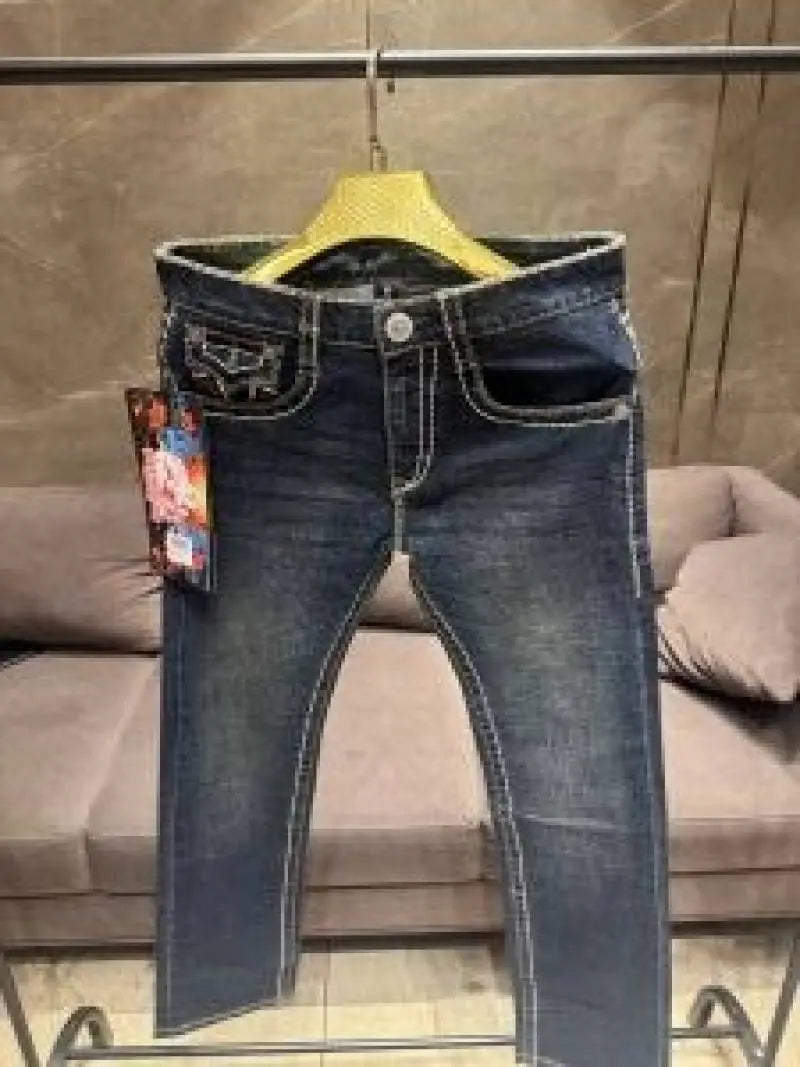 TRUE RELIGION DARK WASH PREMIUM THREAD IMPORTED DENIM