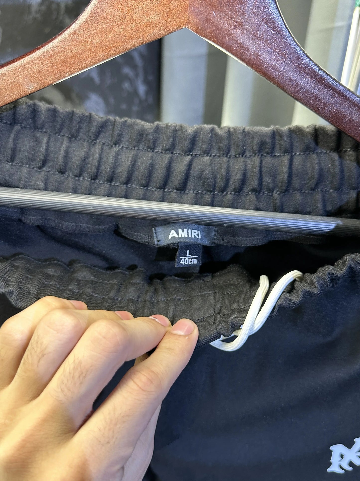 Amir_i Trackpant with Farfetch box packing