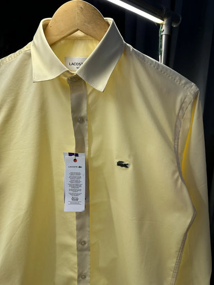 Lacost_e Store article shirt with brand poly bag Yellow