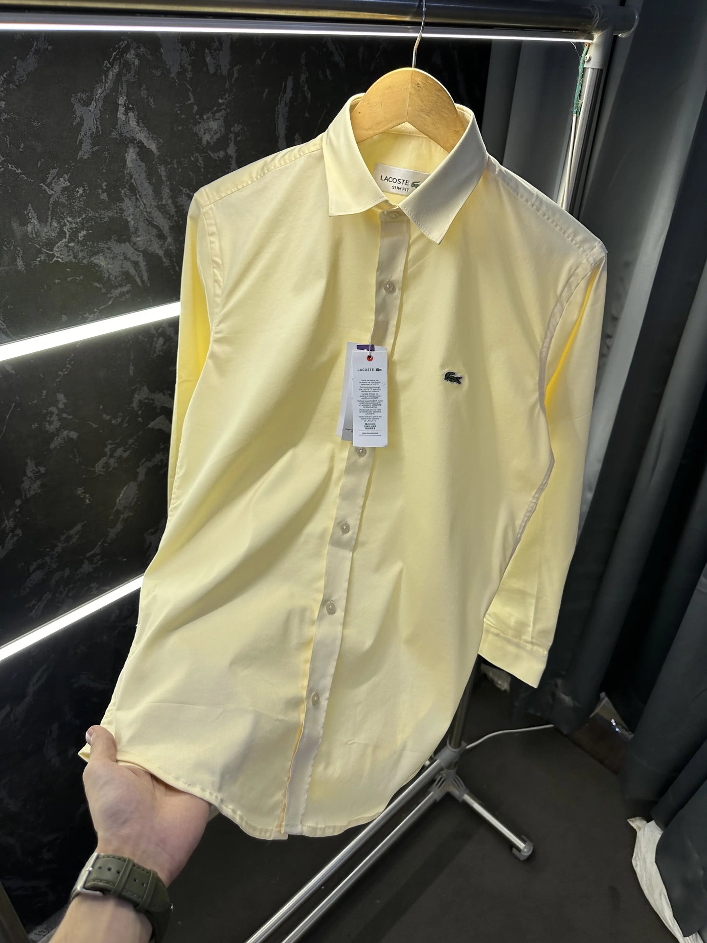 Lacost_e Store article shirt with brand poly bag Yellow