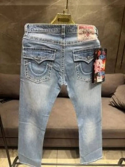 TRUE RELIGION PREMIUM LIGHT WASH PREMIUM THREAD IMPORTED DENIM