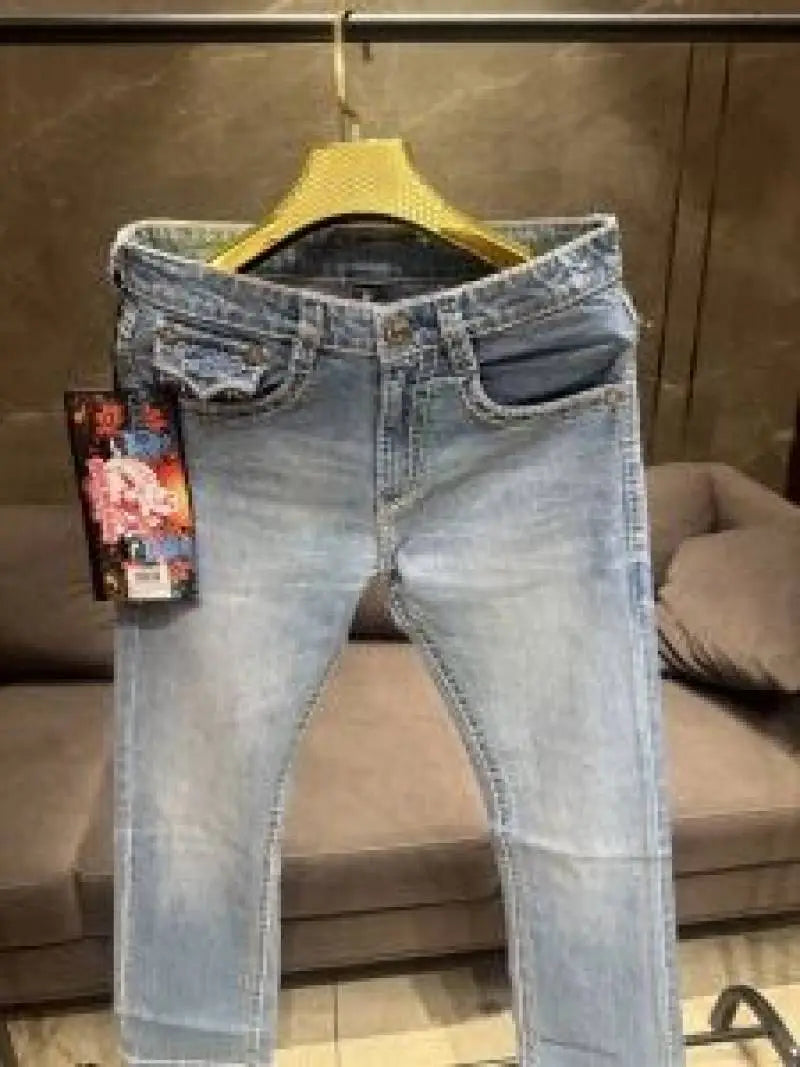 TRUE RELIGION PREMIUM LIGHT WASH PREMIUM THREAD IMPORTED DENIM