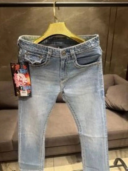 TRUE RELIGION PREMIUM LIGHT WASH PREMIUM THREAD IMPORTED DENIM