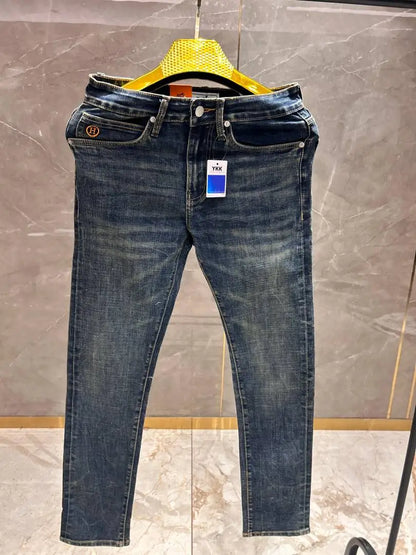 HERMES IMPORTED DARK WASH PREMIUM BACK LOGO DENIM