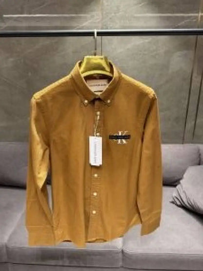 CALVIN KLEI_N MUSTARD PREMIUM FRONT PRINTED SHIRT