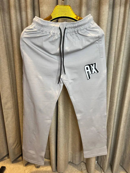 ARMAN_I EXCHANGE GREY AX PREMIUM TRACKPANT